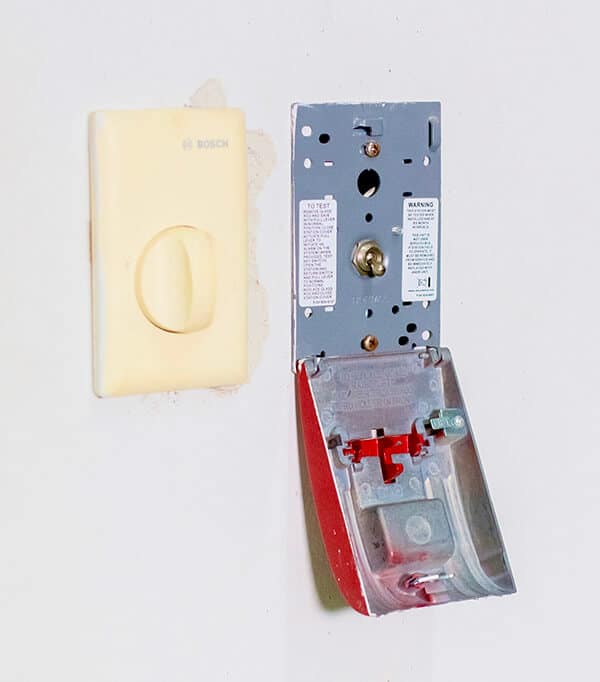 Clean and inspect the fire alarm push button